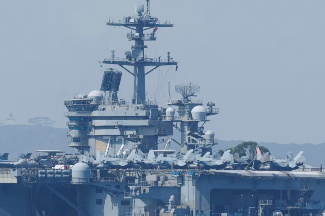 US carrier shoots down Iranian drone as tensions escalate